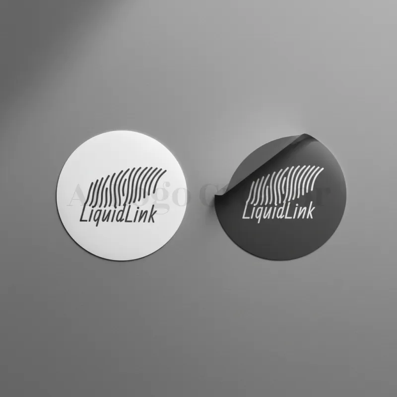 Sticker Mockup-Minimal circular sticker emblem featuring LiquidLink's wave-pattern mark in dual-tone with peeled-edge detail and italic typography.